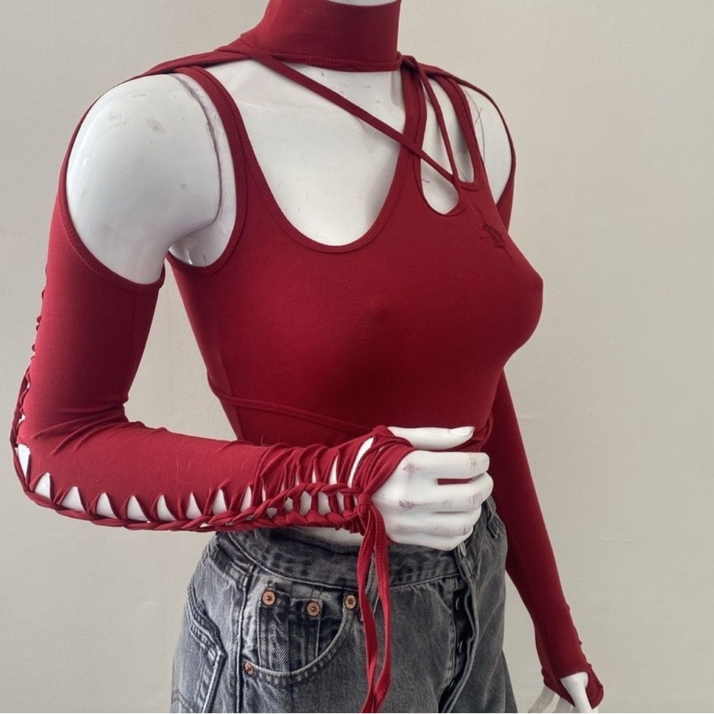 SOLD Darker Wavs Modulation Cut Out Long Sleeve Asymmetrical Mock Neck Top